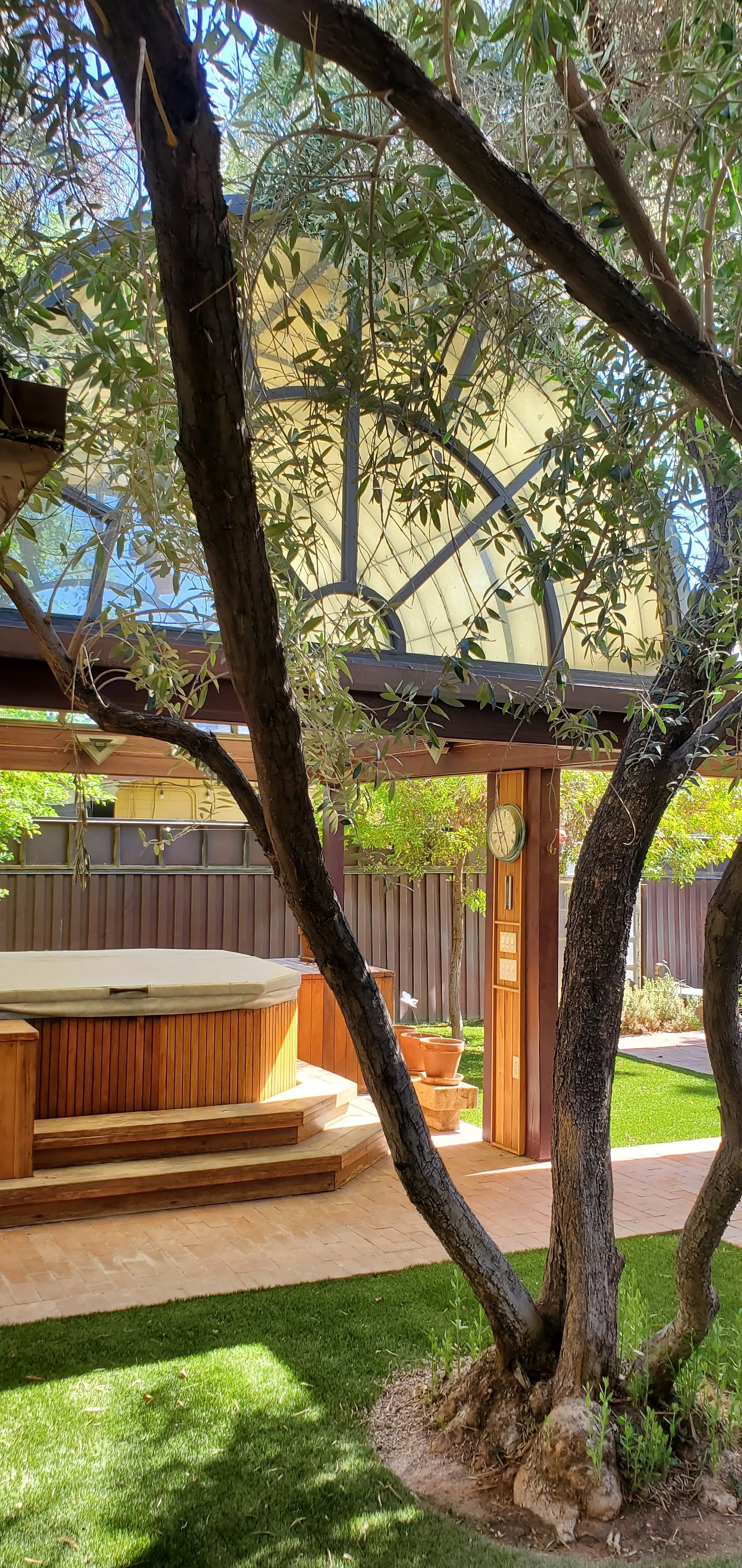 Slate Dominos Residence — beehive fireplace, outdoor kitchen, slate columns