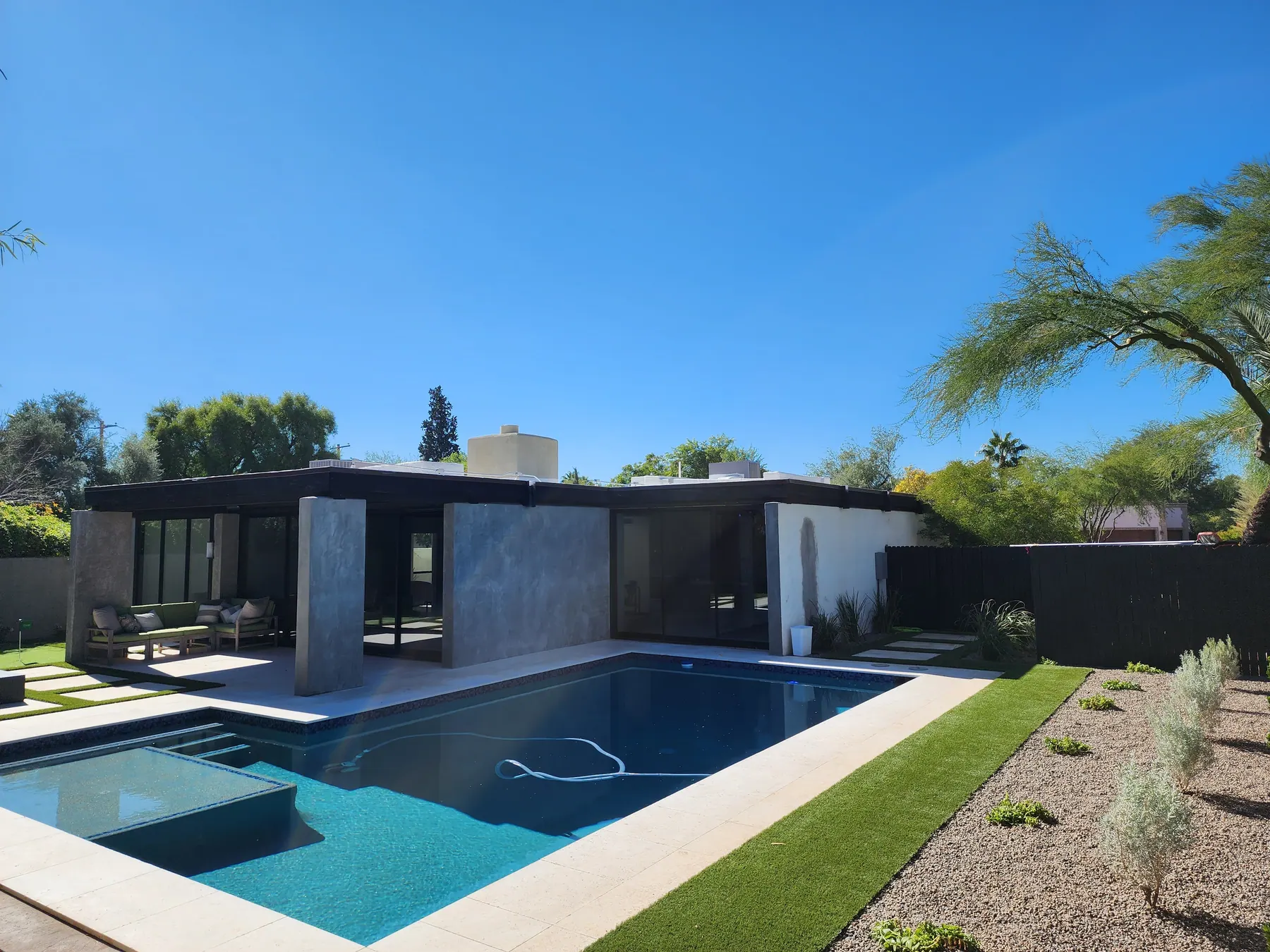 Modern desert pool with loungers — Phoenix metro build