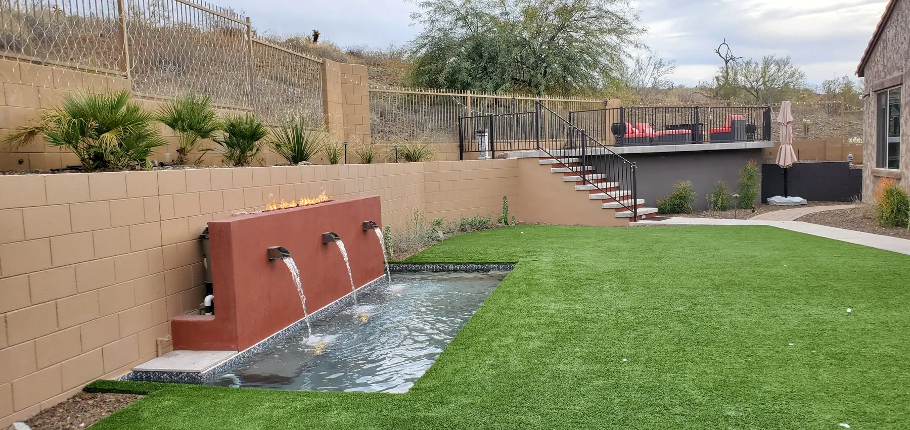 Spool — backyard spa and pool combo with sheer-wall spillover